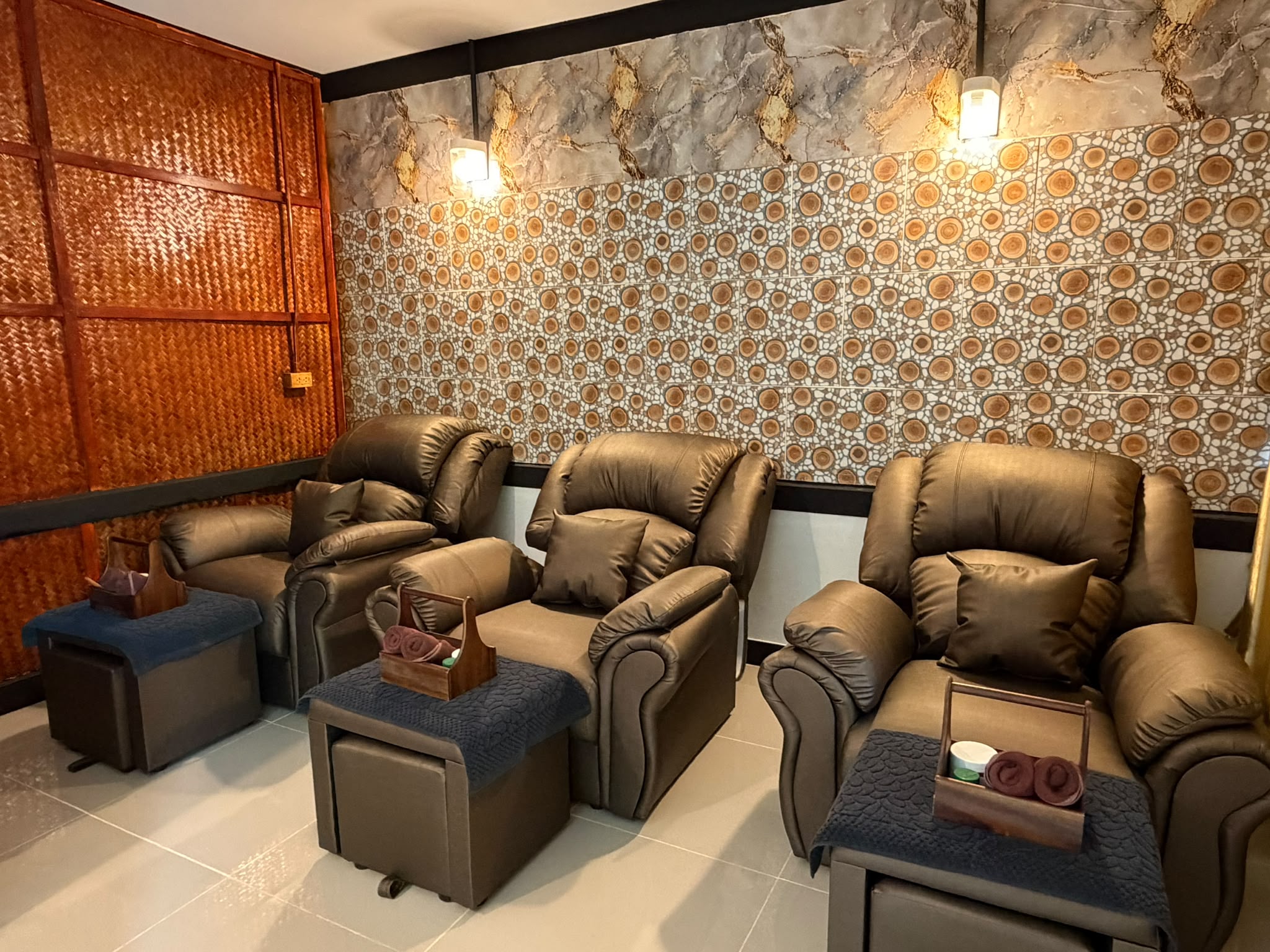 Foot massage area with leather recliner chairs