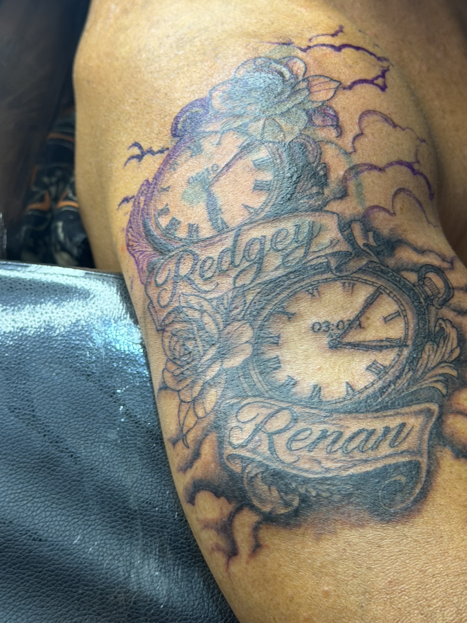 Black and grey pocket watch tattoo with roses and Redgey and Renan name banners
